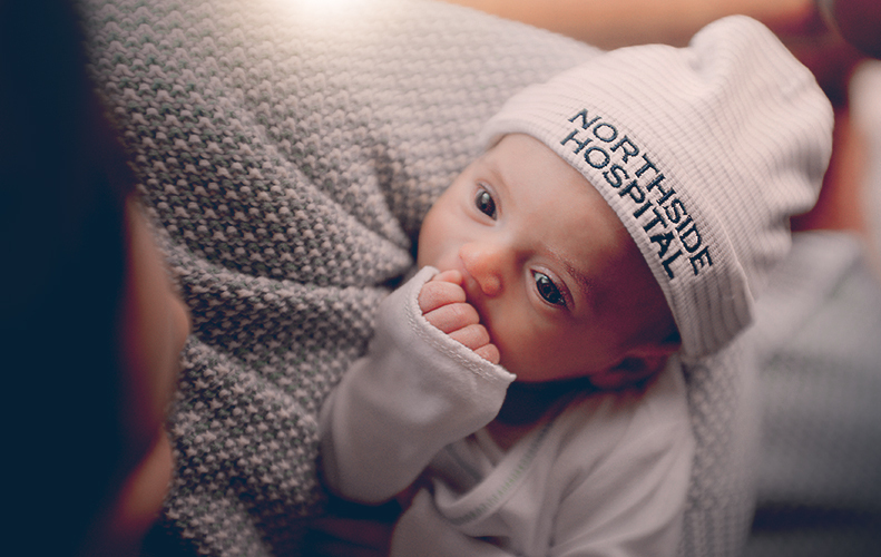 Baby in Northside Hospital Hat and Blanket