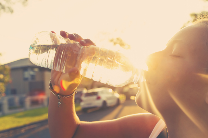 sun woman drinking water